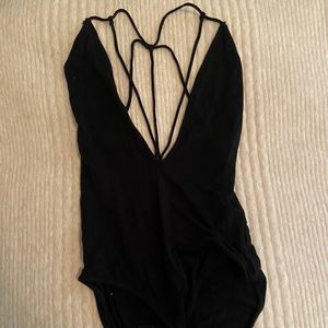 Out from under black bodysuit, size XS!